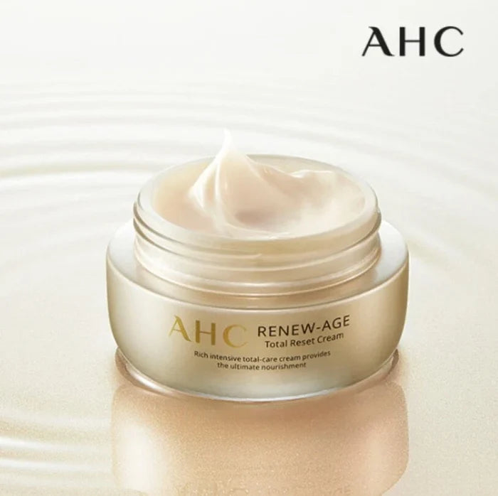 Open jar of AHC Renew Age total Reset Cream 50ml on water background