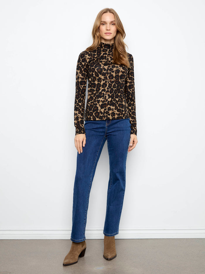 This slim fit leopard print top comes with long sleeves, offering both style and comfort for any occasion. Designed by Charlie B.