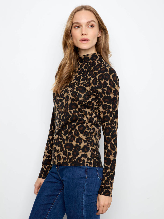 Mock neckline enhances the elegance of this leopard print top, making it an essential piece in your fashion collection by Charlie B.