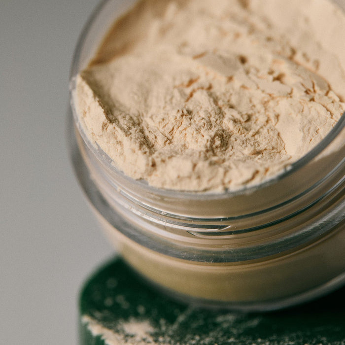 AROMATICA Rosemary Dry Shampoo Powder 10g open container with beige powder, close-up view showcasing product texture and quality.