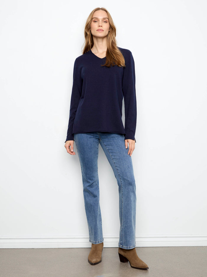 Crafted from soft knit fabric, this piece ensures comfort while maintaining a fashionable look. Exclusively by Charlie B.