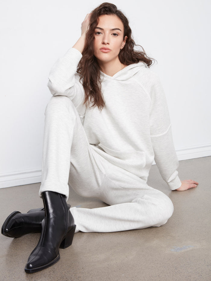 The relaxed fit of this hoodie ensures comfort while maintaining a chic look for any casual outing. By Charlie B.