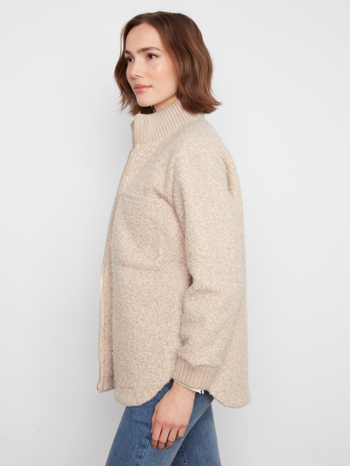 Featuring a rounded hem, this jacket offers a modern silhouette and comfortable fit. By Charlie B.