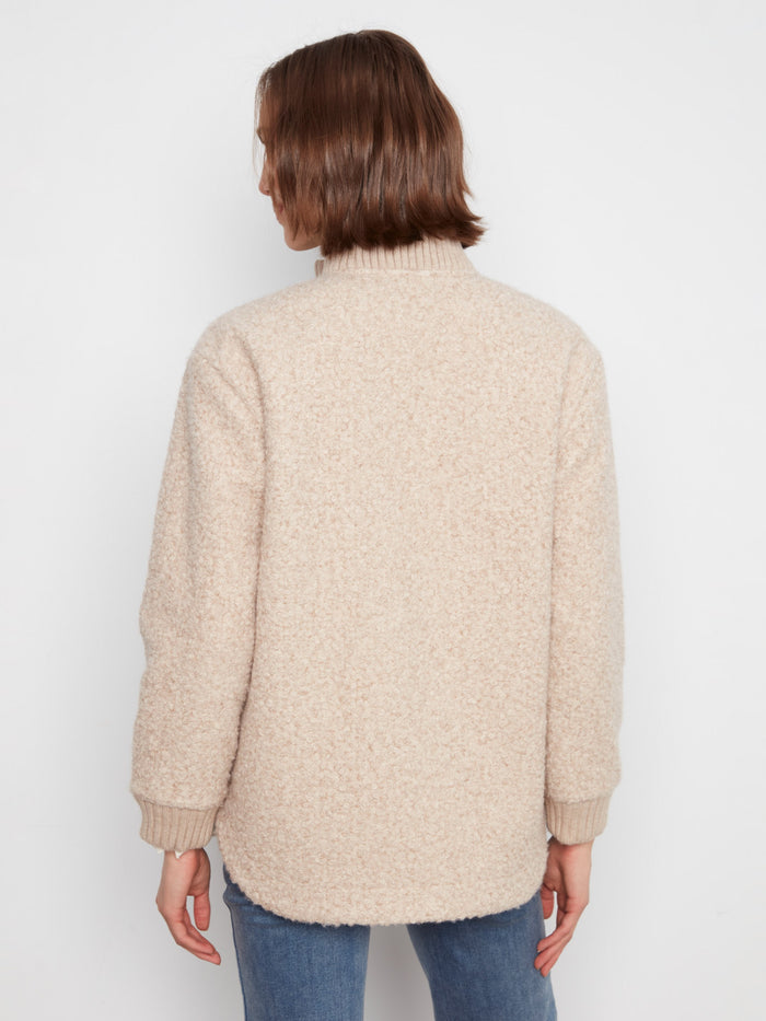Equipped with chest pockets, this jacket combines functionality with trendy design. By Charlie B.