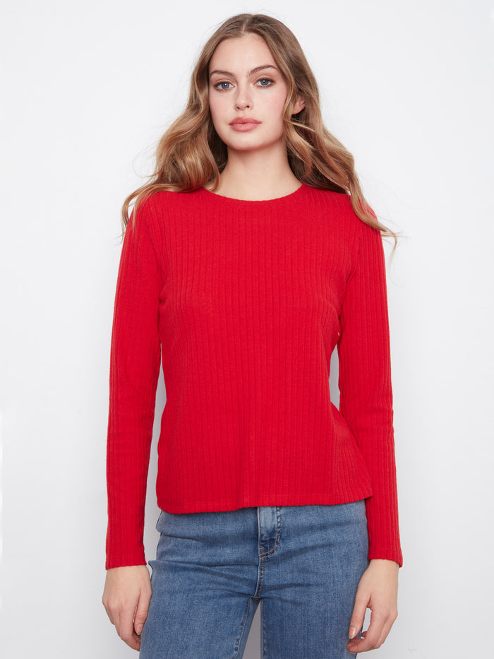 Enjoy the soft and stretchy material of this red top, ensuring comfort throughout your day without compromising on style by Charlie B.