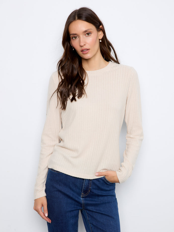 Elegant crew neck sweater in a soft, brushed ribbed fabric, ideal for layering. By Charlie B.