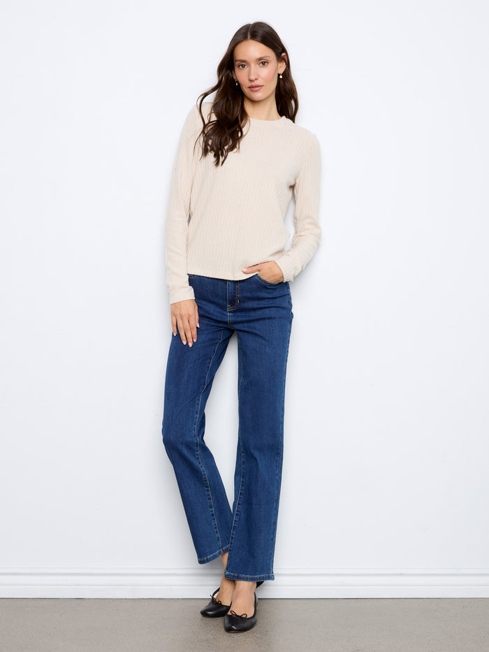Stylish long-sleeved top crafted from soft and stretchy materials for comfort. By Charlie B.