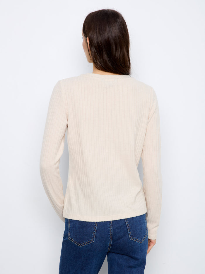 Soft and stretchy fabric ensures this sweater drapes beautifully for everyday wear. By Charlie B.