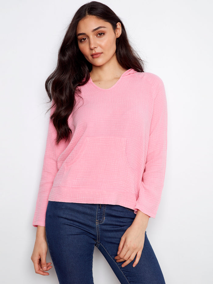 Pink cotton hoodie featuring a stylish kangaroo pocket for convenience by Charlie B.