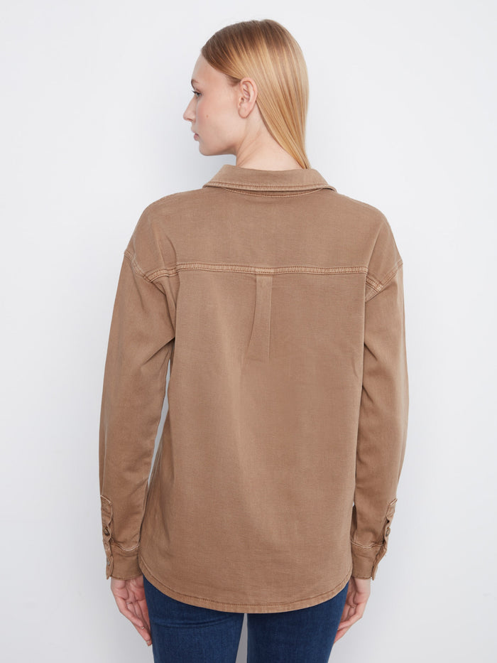 The button-front closure offers easy wearability while maintaining a sleek look for any outfit combination. By Charlie B.