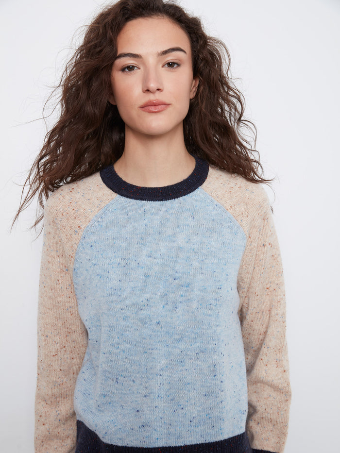 Enjoy the contrast trim on this stylish sweater, offering a modern twist to classic knitwear. Ideal for layering by Charlie B.