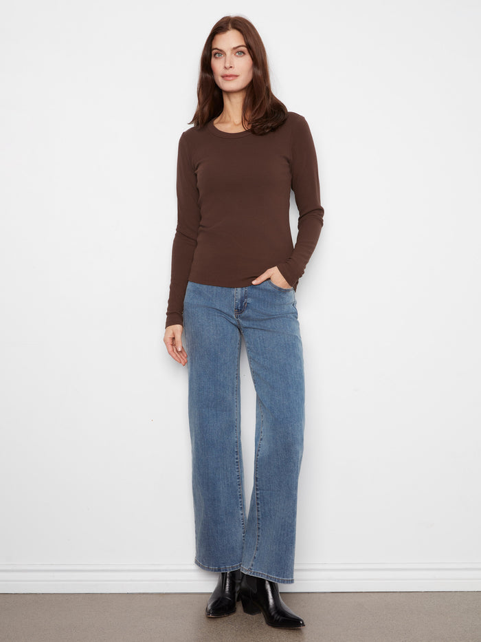 Enjoy the comfort of long sleeves in this slim fit top, crafted with care. A must-have addition to your wardrobe by Charlie B.