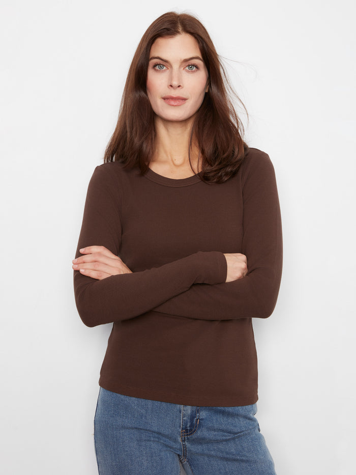 Achieve a flattering silhouette with this slim fit design, ideal for layering or wearing alone. Crafted thoughtfully by Charlie B.