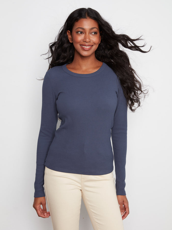 Elegant slim fit and crew neckline define this ribbed midnight blue top, perfect for layering by Charlie B.