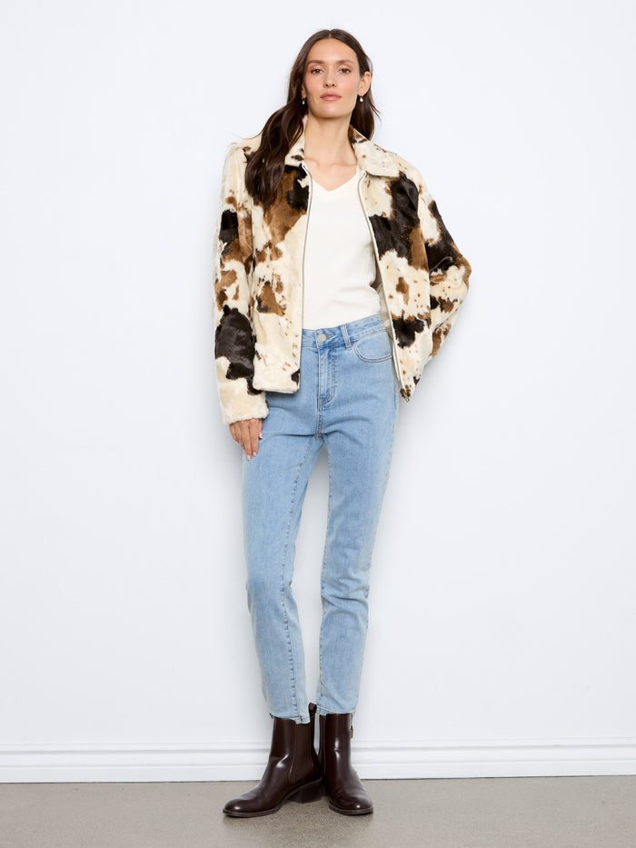 Embrace the softness of this cow print faux fur jacket, perfect for a chic yet comfortable outfit by Charlie B.