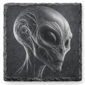 Laser engraved creepy alien slate coaster on natural slate