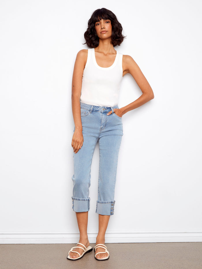 Stylish slim fit jeans with a cropped length and five-pocket design, perfect for casual outings. By Charlie B.