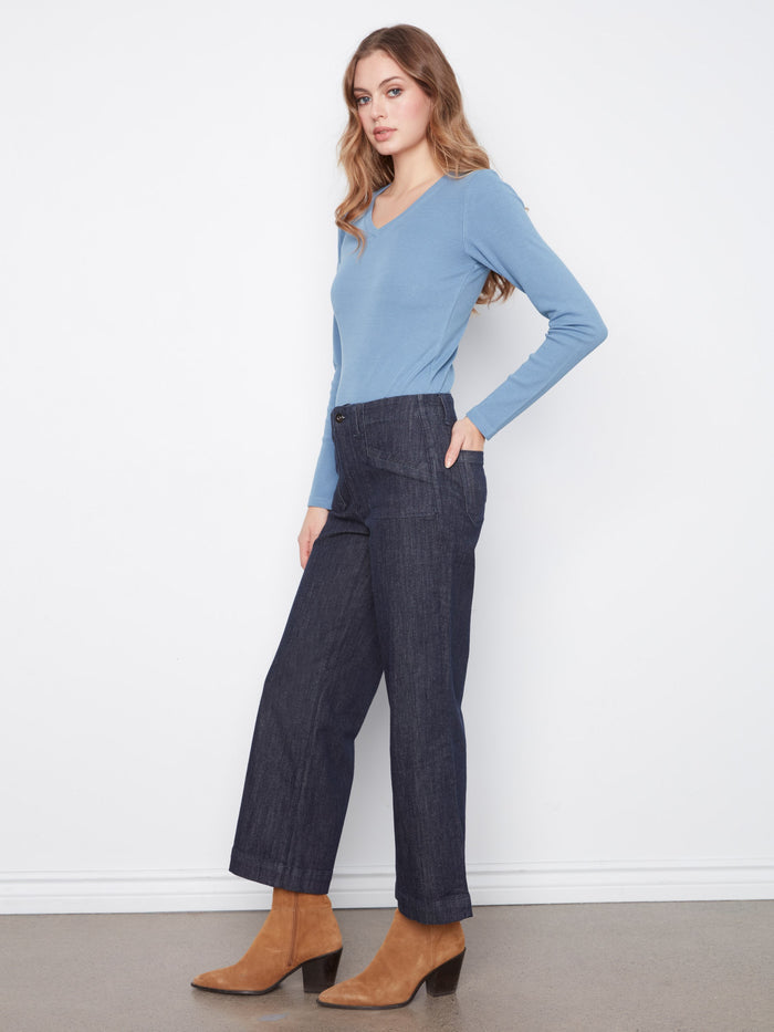 Comfortable stretch denim pants that offer ease of movement and style. Crafted by Charlie B.