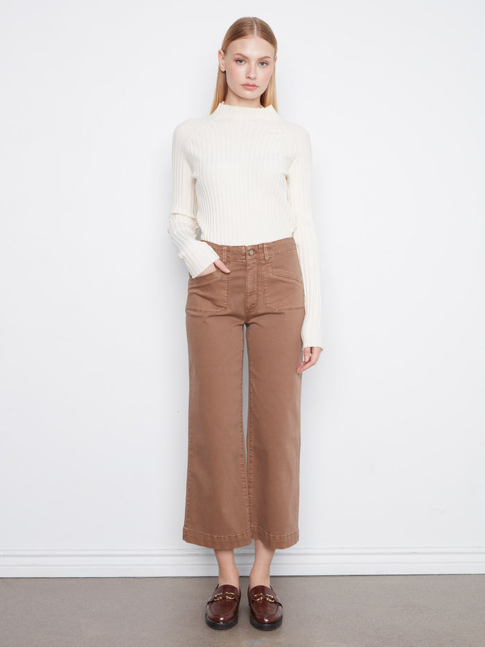 These pants feature a wide leg design, adding a touch of elegance to any outfit. Perfect for casual or formal settings by Charlie B.
