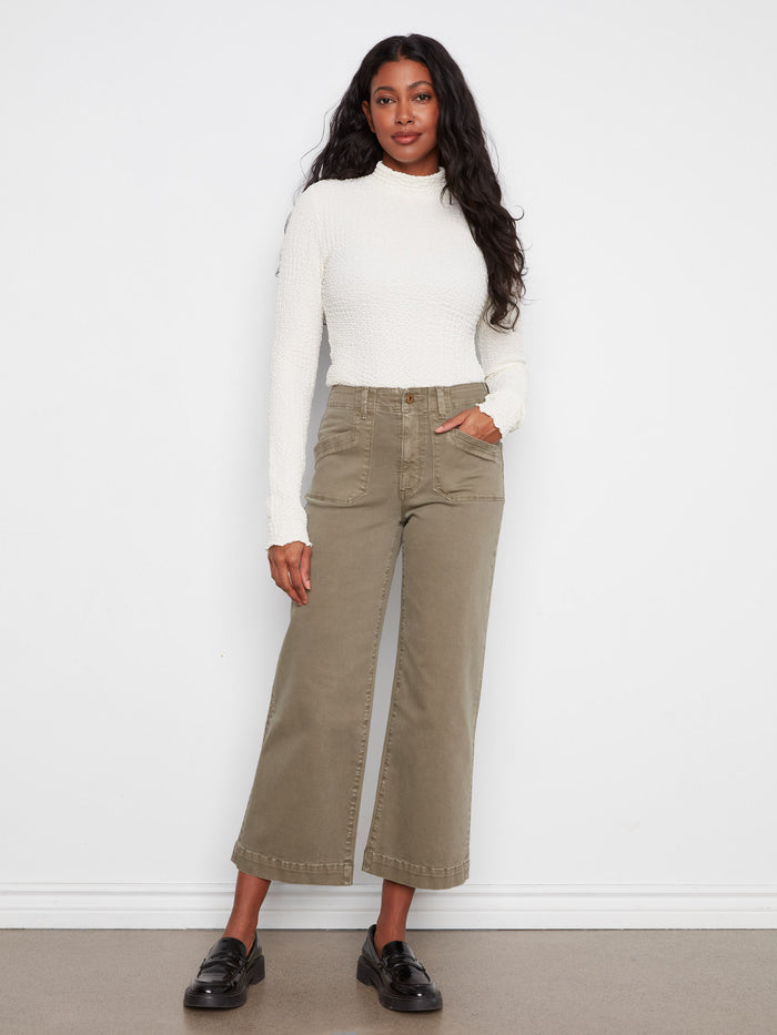 These pants feature a wide leg design, offering a relaxed and stylish fit for any occasion. By Charlie B.