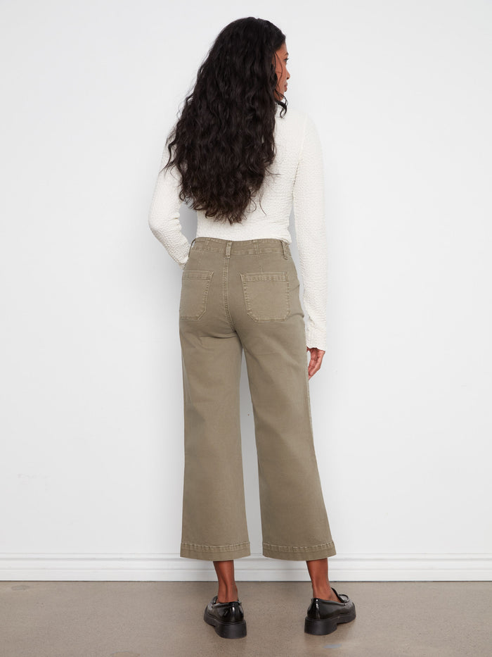 Designed with rectangular patch pockets, these pants combine functionality with style. By Charlie B.