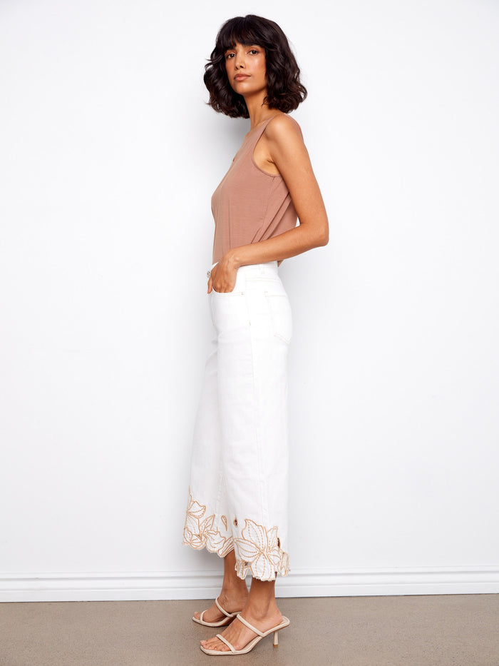 The wide fit of these white jeans ensures a relaxed yet chic silhouette for versatile styling by Charlie B.
