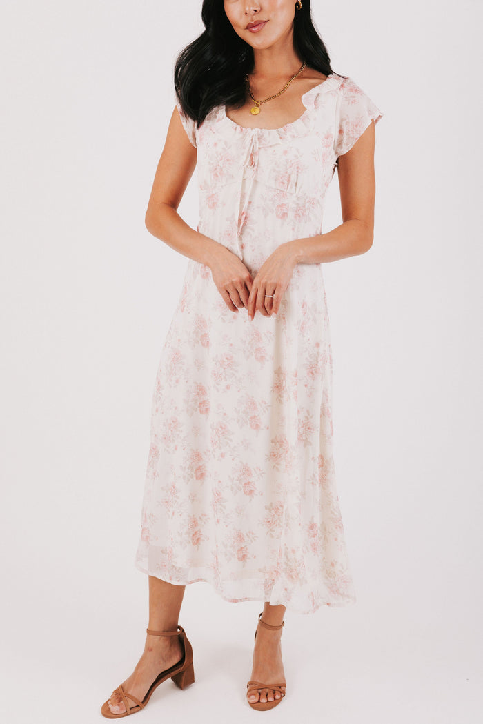 pink floral midi dress with ruffled neckline