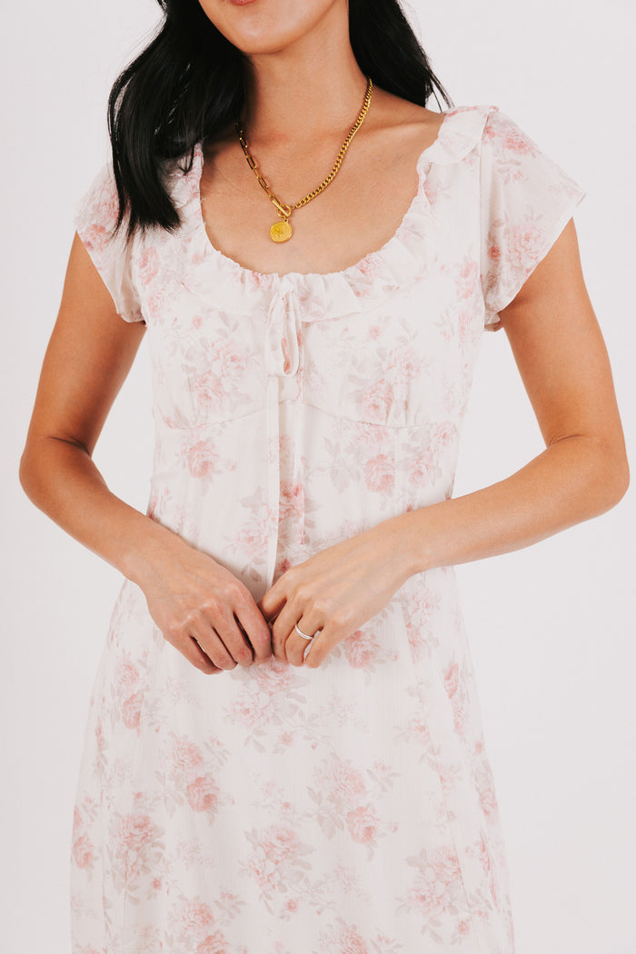 pink floral midi dress with ruffled neckline
