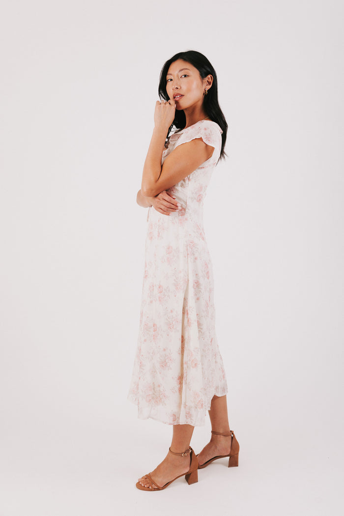 pink floral midi dress with ruffled neckline