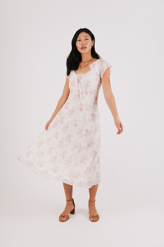 pink floral midi dress with ruffled neckline