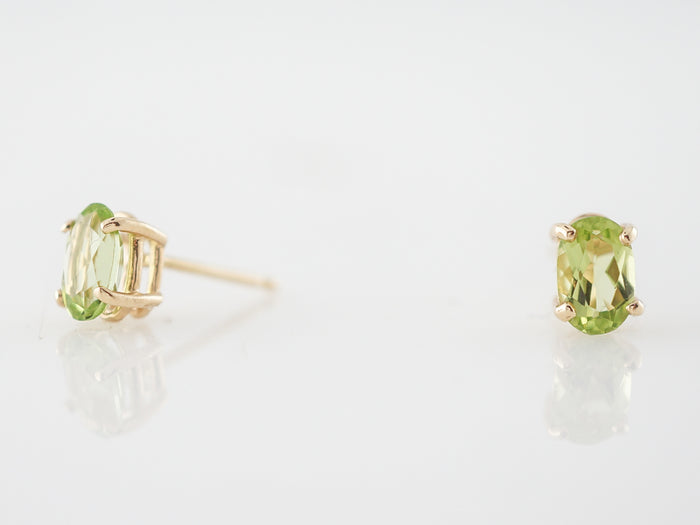 Earrings Modern .80 Oval Cut Peridot in 14k Yellow Gold