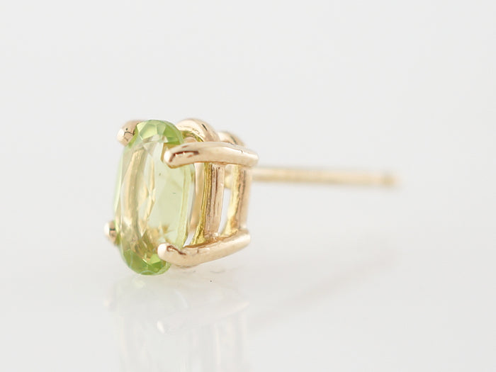 Earrings Modern .80 Oval Cut Peridot in 14k Yellow Gold