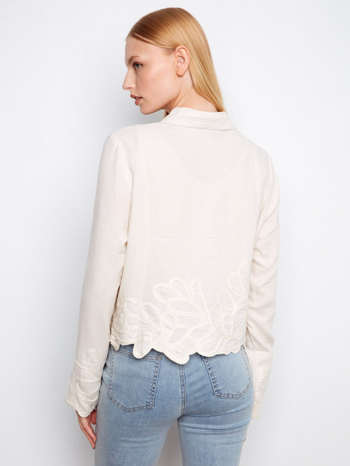 With its unique embroidered detailing, this jacket stands out as a fashionable choice for any occasion by Charlie B.