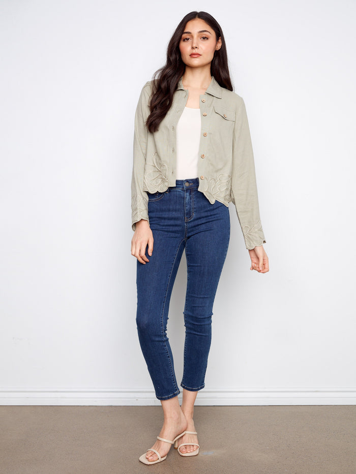 Adorned with an embroidered hem and cuffs, this jacket adds a touch of sophistication to any ensemble. A versatile piece by Charlie B.