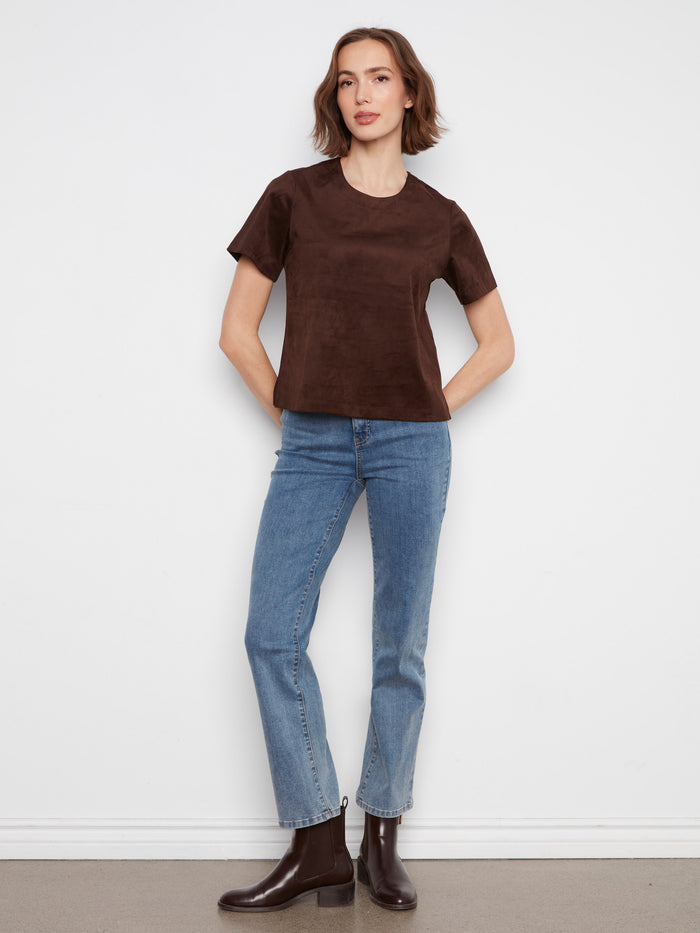 This top boasts a straight fit, ensuring comfort while maintaining an elegant appearance for versatile styling by Charlie B.