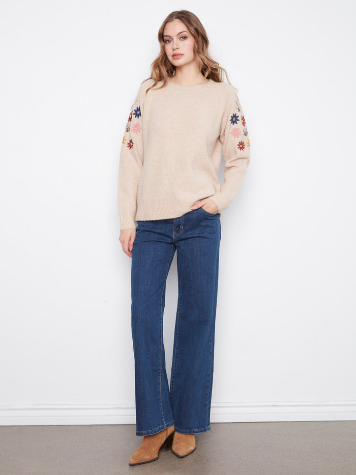 Enjoy the ribbed cuffs and hem of this cozy knit sweater, perfect for any casual outing. By Charlie B.