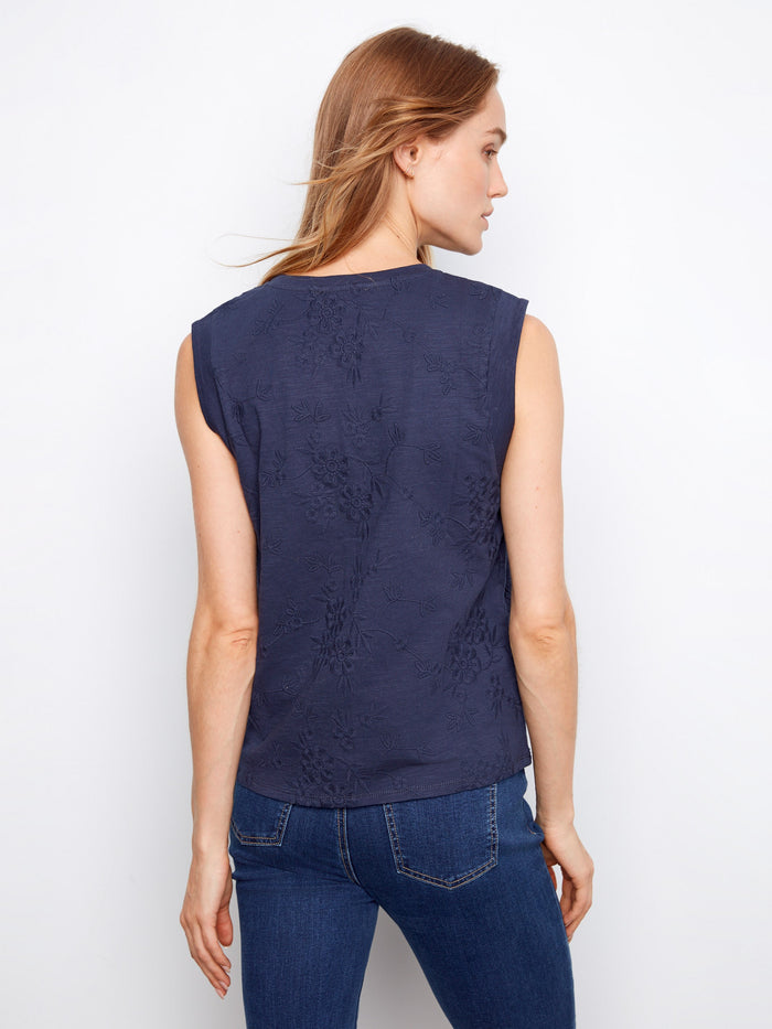 Stylish navy sleeveless top adorned with beautiful floral patterns, ideal for casual wear by Charlie B.