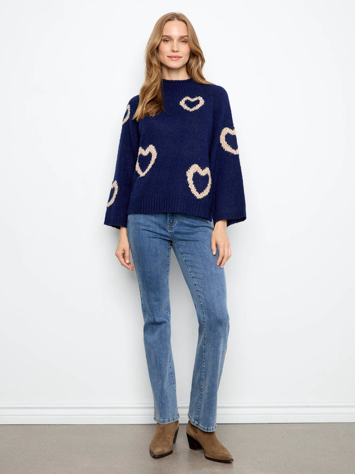 Comfortable navy sweater adorned with whimsical hearts, designed in a relaxed fit to enhance your wardrobe by Charlie B.