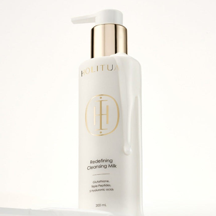 HOLITUAL Redefining acleansing Milk 200ml bottle with gold cap