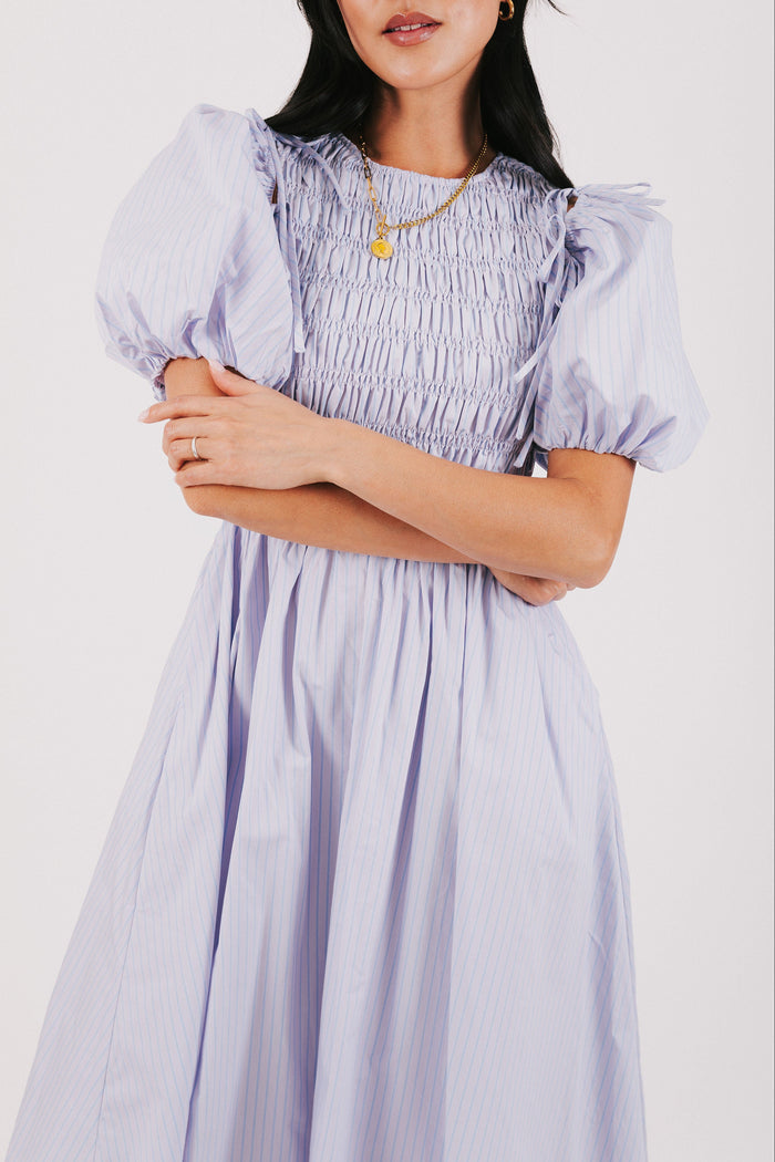 purple and blue striped dress with detachable puff sleeves front