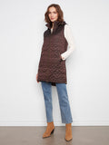 Quilted design vest with a sleek zip-front closure, perfect for layering in cooler weather. By Charlie B.