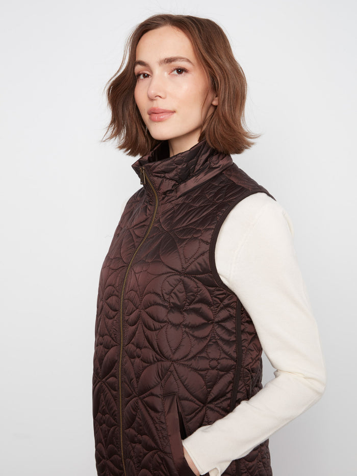 This vest features a relaxed fit, offering comfort and style for any casual outing. By Charlie B.
