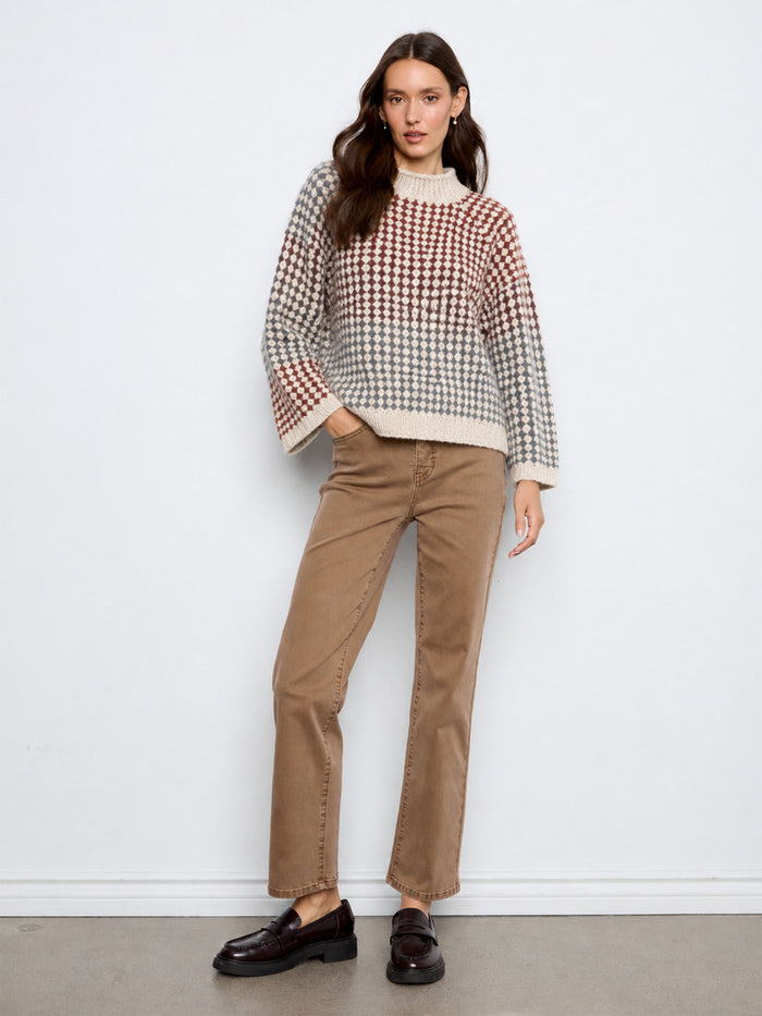 Chic sweater with 3/4 bell sleeves adding a touch of elegance to any outfit. Comfortable and versatile. By Charlie B.