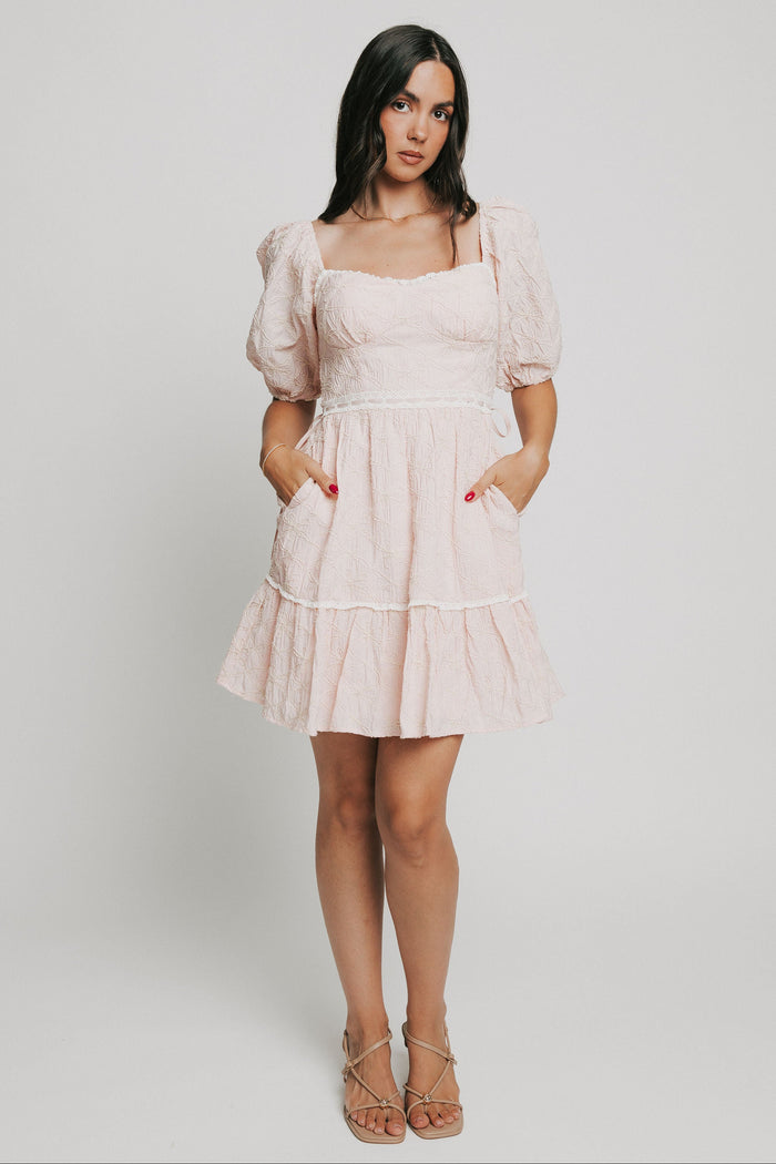 pink bow patterned mini dress with white lace trim