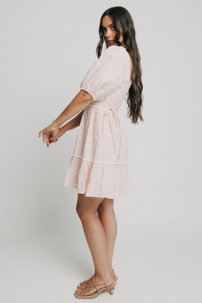 pink bow patterned mini dress with white lace trim