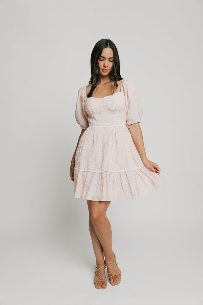pink bow patterned mini dress with white lace trim