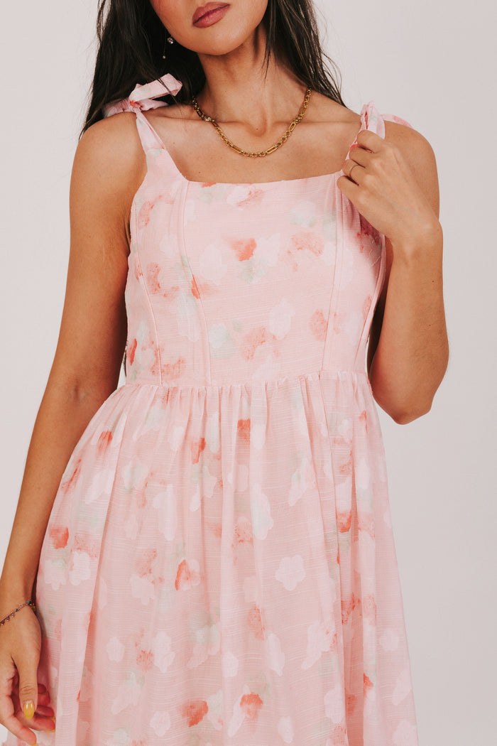 pink midi dress with sheer floral overlay