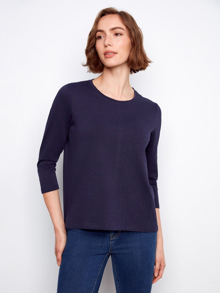 Sophisticated top showcasing 3/4 sleeves, ideal for versatile styling across seasons. A stylish piece by Charlie B.