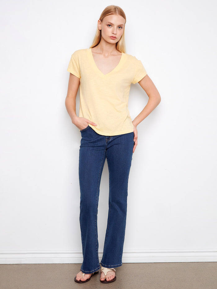 Stay cool in this lightweight cotton tee featuring a classic V-neck, ideal for layering or wearing alone. By Charlie B.