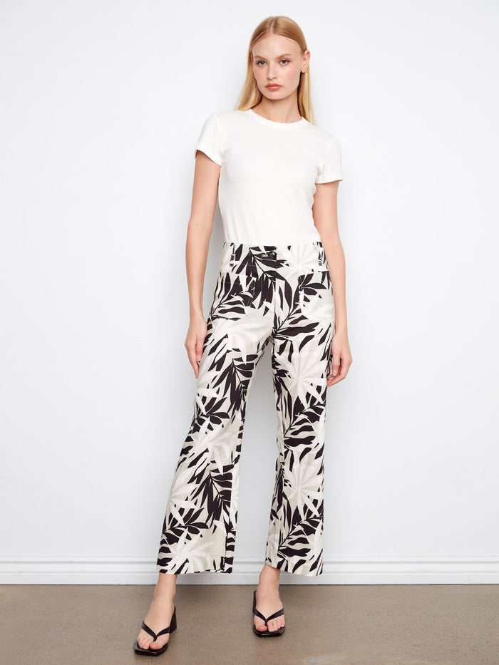 Wide-leg pants in a black and white leaf design, featuring a cropped length for a chic look by Charlie B.